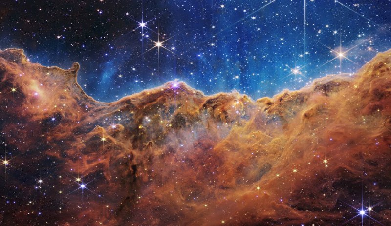 美国航天局12日公布了更多韦伯空间望远镜拍摄的全彩宇宙图像及光谱图